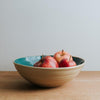 Handmade serving bowl with apples