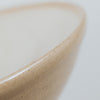 Closeup of cream serving bowl interior