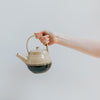 Handmade Teapot In Hand for Scale