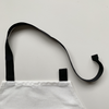 Close up of black apron neck loop
